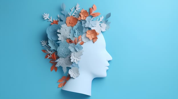 World mental health day concept. Paper human head symbol and flowers on blue background photo