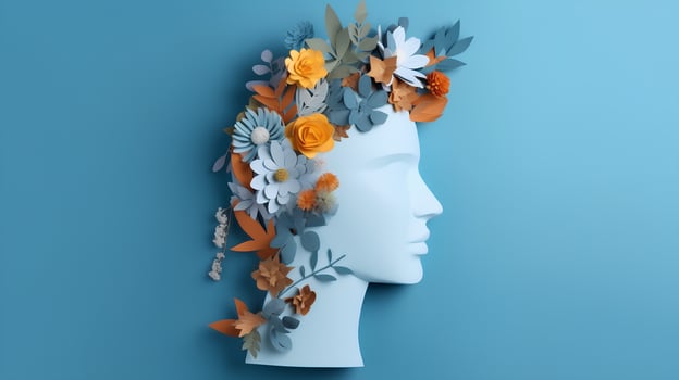 World mental health day concept. Paper human head symbol and flowers on blue background photo