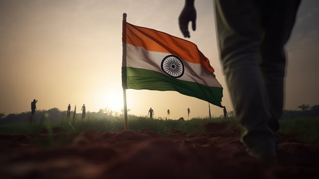 India flag being pushed into the ground by a male silhouette. Generative ai photo