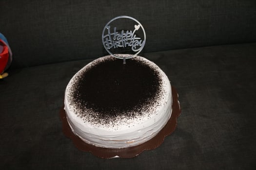 Birthday cake with black background photo