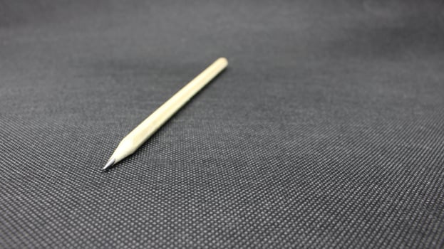 Pencils on a black background photo