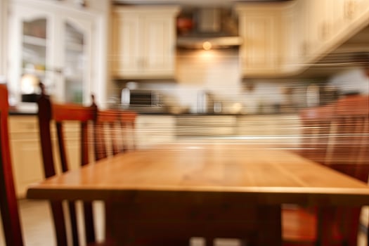 modern kitchen with a table and chairs photo