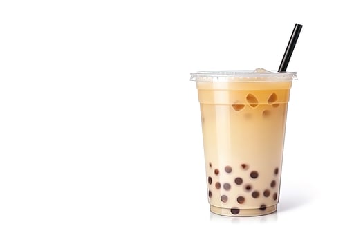 iced milk tea and bubble boba in the plastic glass on the white background with copy space. ai generated photo