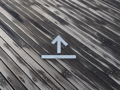 Wood background with arrow photo