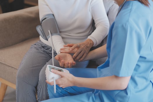 Mental health counselor. Young woman during therapy session talking with a psychologist in the office. photo