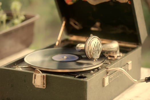 Vintage shot of a retro gramophone with a vinyl record. photo