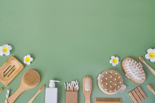Directly above view of spa products on green background, Healthcare spa concept with copy space photo