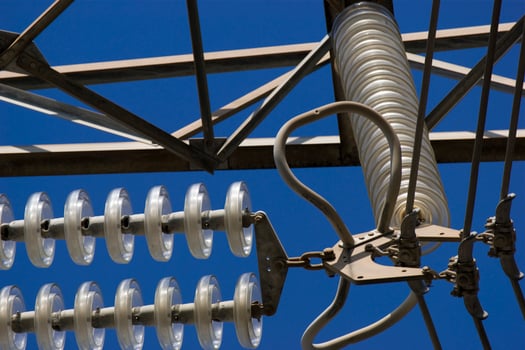 a close up of a power line with wires attached photo