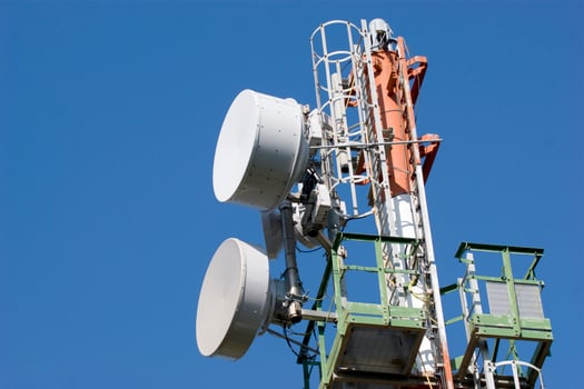 a cell phone tower with two antennas photo
