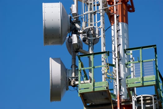 a cell phone tower with two antennas photo