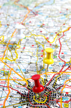 a red push pin is on a map of a city photo