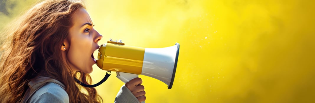 Beautiful woman with megaphone photo