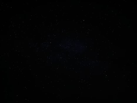 Photo of the starry sky. Summer spring Triangle of bright stars Vega alpha Lyra, Deneb alpha Cygnus and Altair alpha Eagle.