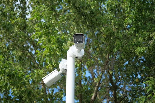 CCTV security camera operating outdoor photo