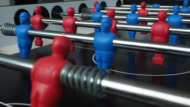 Football table or soccer table game with plastic player figurine. Mini Soccer game which famous in past and be collectable item for foosball lover. Play by two hand control each row of player figurine photo