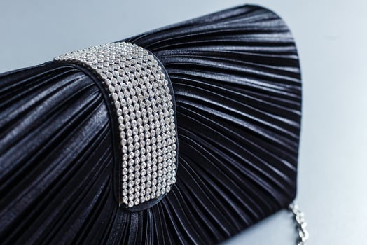 Luxury black women bag isolated over white photo