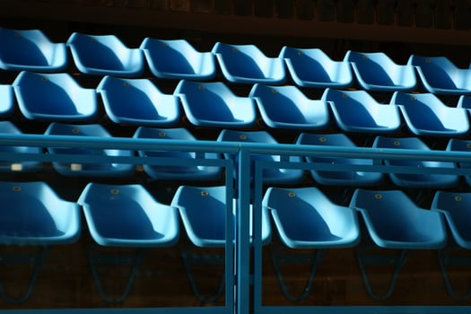 a row of blue chairs photo