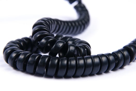 a black cord with a white background photo