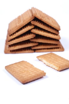 a pile of biscuits on a white background photo