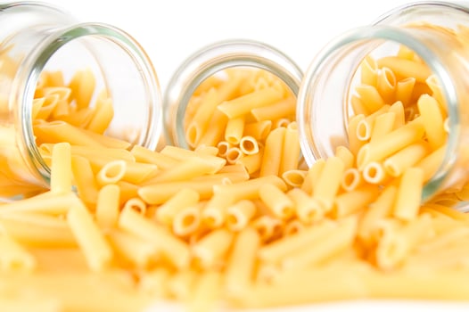 three glass jars filled with pasta photo