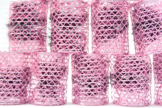 a pile of blue and pink mesh bags photo