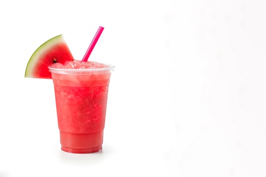 watermelon smoothie in take away cup with watermelon sliced isolated on white background with copy space. ai generated photo