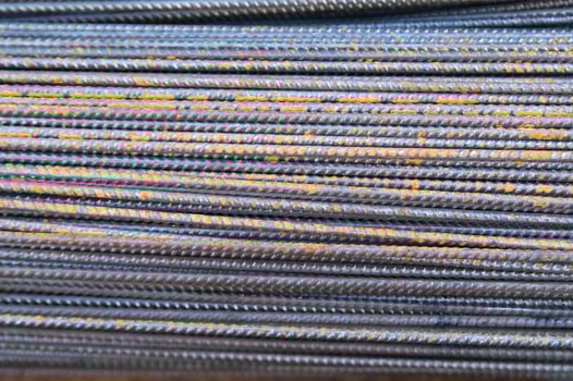 a pile of steel bars with rust on them photo