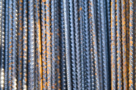 a pile of steel bars with rust on them photo