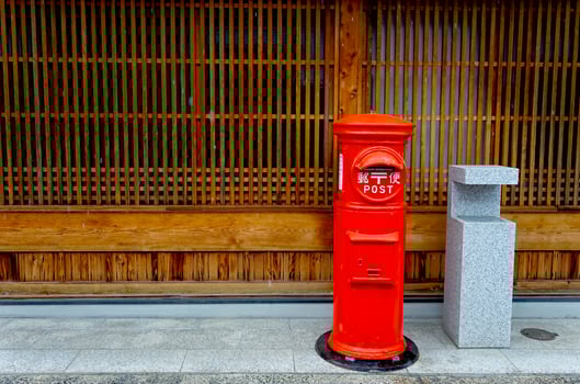 Japan post box with snow drop photo