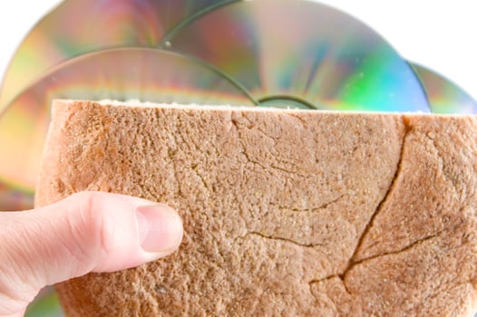a sandwich with a cd on top of it photo