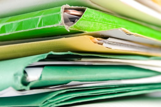 Stack of practices to be processed in the office photo