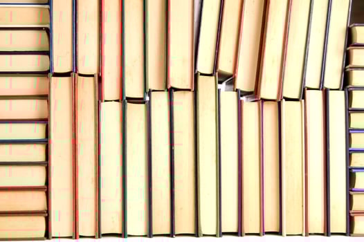 a stack of books on a white background photo