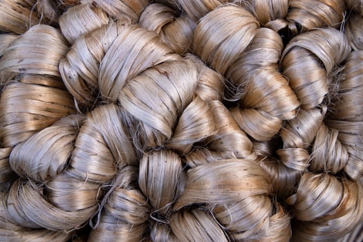 Thick Golden bundle of raw jute fiber Pattern Texture Can be used as a Background wallpaper photo
