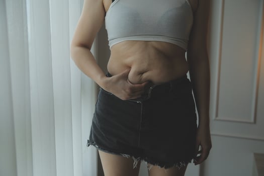 Fat woman measuring , fat woman fat belly chubby paunchy sport recreation health care lose belly fat do not exercise concept photo