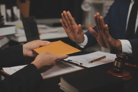 Business and lawyers discussing contract papers with brass scale on desk in office. Law, legal services, advice, justice and law concept picture with film grain effect photo
