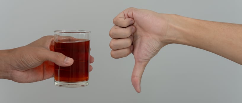 man refuses say no and avoid to drink an alcohol whiskey , stopping hand sign male, alcoholism treatment, alcohol addiction, quit booze, Stop Drinking Alcohol. Refuse Glass liquor, unhealthy, reject photo