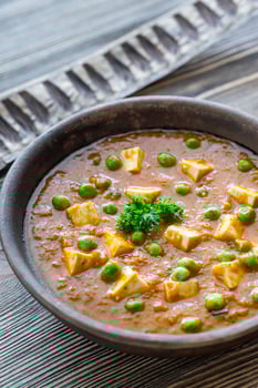 Bowl of mattar paneer photo