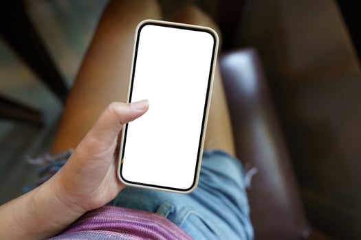 Close up of women's hands holding cell telephone blank copy space screen. smart phone with technology concept photo