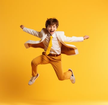 Energetic Young Boy Jumping on a Vibrant Yellow Background AI Generated photo