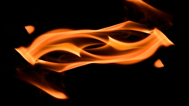 fire background burning flame frame on a black background photo