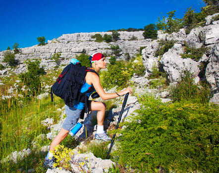Sporty teenager in mountains photo