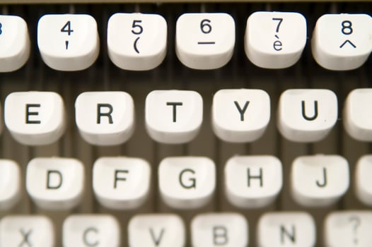 a close up of a typewriter keyboard with the letters oop photo