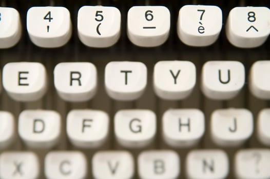 a close up of a typewriter keyboard with the letters oop photo