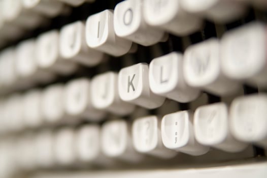a close up of a typewriter keyboard with the letters oop photo