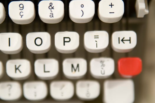 a close up of a typewriter keyboard with the letters oop photo