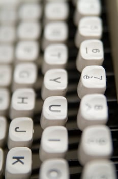 a close up of a typewriter keyboard with the letters oop photo