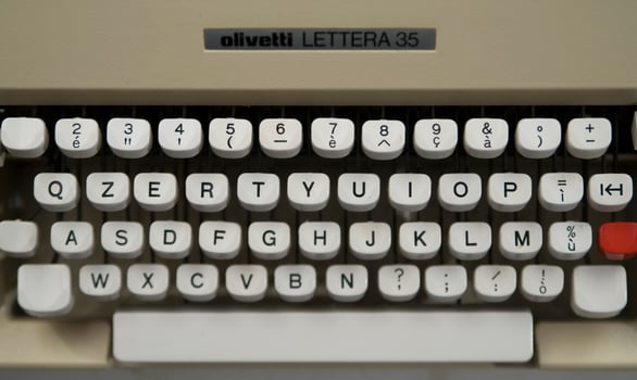 a close up of a typewriter keyboard with the letters oop photo