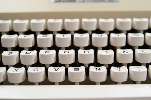 a close up of a typewriter keyboard with the letters oop photo