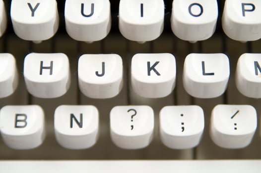 a close up of a typewriter keyboard with the letters oop photo