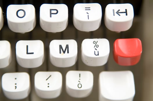 a close up of a typewriter keyboard with the letters oop photo